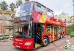 Der rote City Sightseeing Doppeldeckerbus